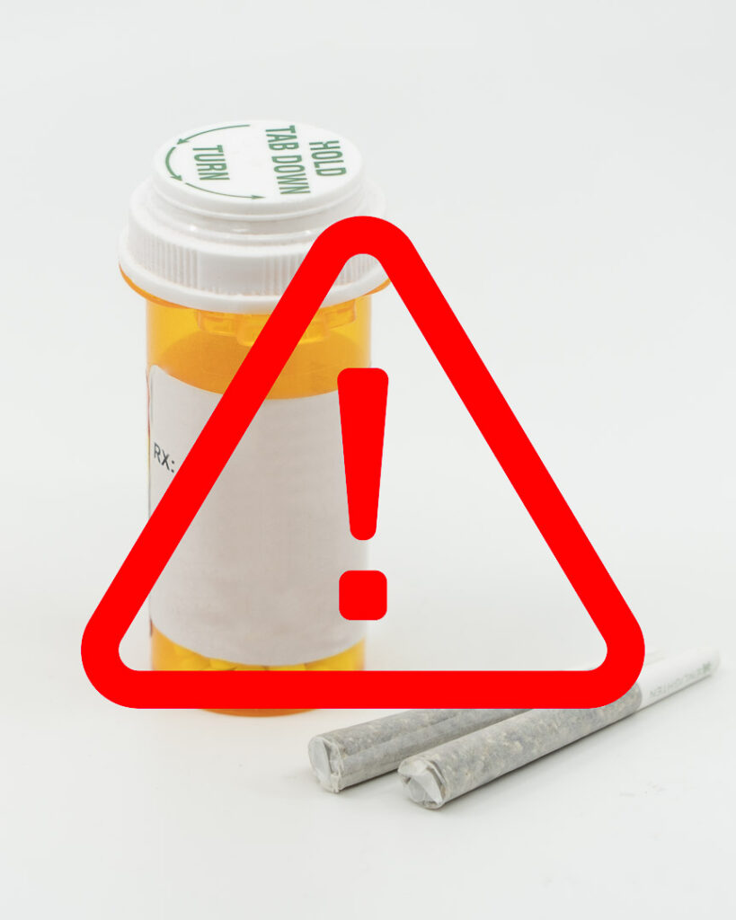 Warning sign on a prescription medication bottle next to Cannabis joints